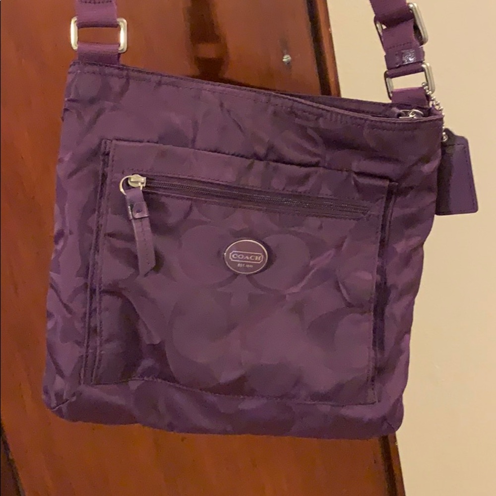 Used Vintage Coach crossbody purse.